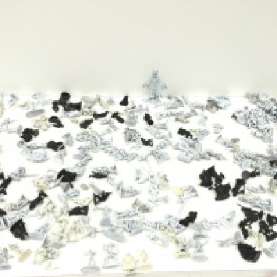 A box containing in excess of 250 metal figures from a warhammer collection mostly unpainted. Made by Grenadier ..Ral Partha and others