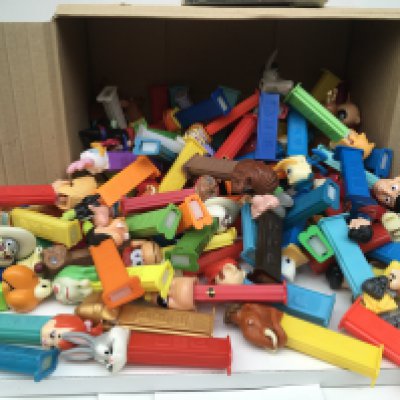 Box containing a collection of PEZ sweet dispensers