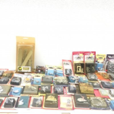 A collection in excess of 50 packaged metal model figures in original bubble display boxes . From a Warhammer collection.
