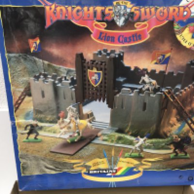 2 boxed Britains Knights of the Sword Lion Castles without figures. Also includes Shield Tower.(2)