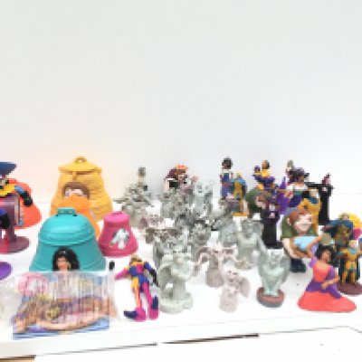 A collection of approximately 50 pieces of Disney including figures and accessories. Theme is Hunchback of Norte Dame