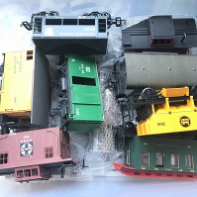 A Box Containing G Gauge Wagons and Locomotives.