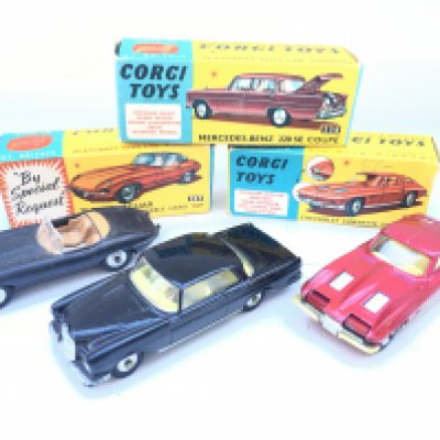 A Boxed Corgi E Type Jaguar (Re-Painted) a Mercedes-Benz 220 SE Coupe #230 and a Chevrolet Corvette Sting Ray #310. NO RESERVE