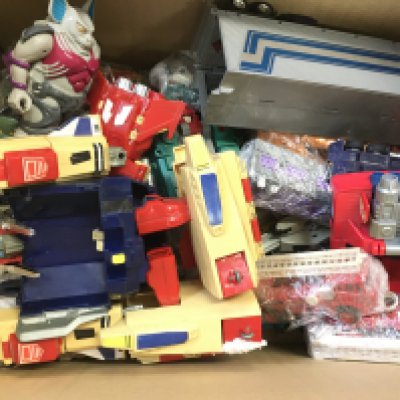 A Box Containing Loose G1 and G2 Transformers Etc.