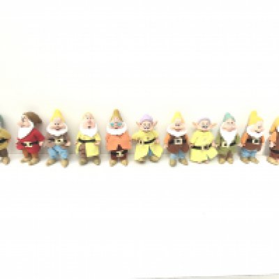 A collection of the dwarfs featured in Snow White film. 11 in total Disney.