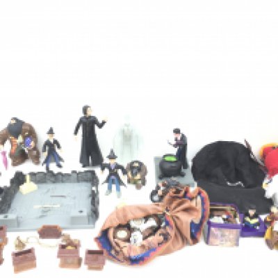 A collection of Harry Potter figures and accessories and games.