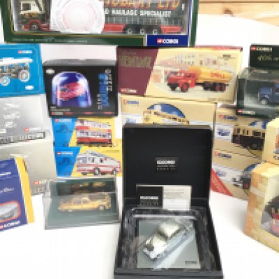 A Collection of Boxed Corgi Classics including a Morris Minor in Display case. No Reserve.
