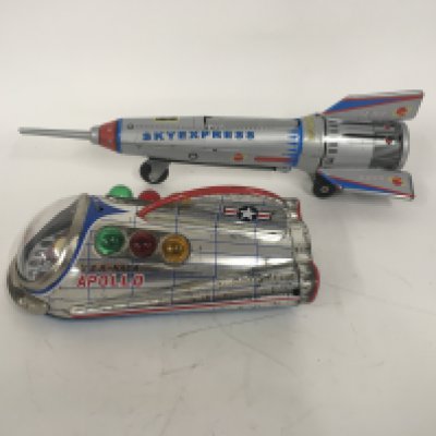 A pair of tinplate space toys. SKYEXPRESS is friction operated. APOLLO is battery operated. NO RESERVE
