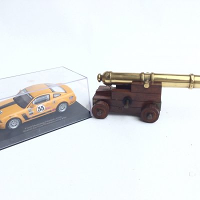 A Boxed Autoart Ford Mustang Slot Racing Car and a Small Model Cannon. NO RESERVE