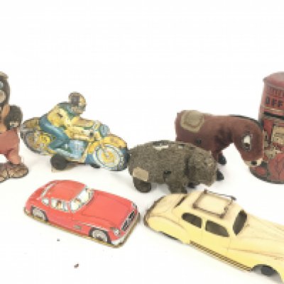 A Collection of Worn Tinplate Toys. Including a Mickey Mouse Money Box.