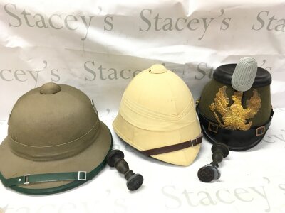 Three reproduction military hats (Afrika Korps, British and German WW1 Jeager) and two stamps. No reserve