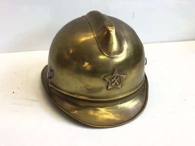 A Russian brass vintage fireman’s helmet.