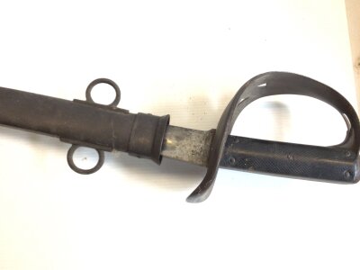An 1890 pattern British Duke of Lancaster Cavalry sword the steel blade with military stamp marks.