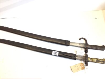 Two French 19th Century Yatagan sword bayonets with engraved steel blade’s dated 1868 and 1871 (2)