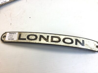 A curved Enamel sign London Blackshaw finish 31cm long 3.3cm wide.