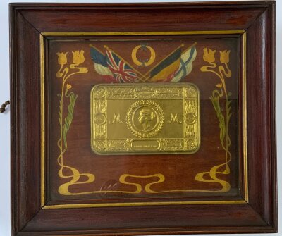 A framed Princess Mary tin, with hand painted allied flag decoration.