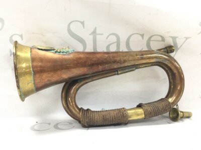 A vintage copper military bugle for Royal Welsh Fusiliers, 29Cm long