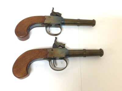 A pair of Replica Canon barrel slab sided Percussion pistols with twist off brass barrels length 19cm (2)