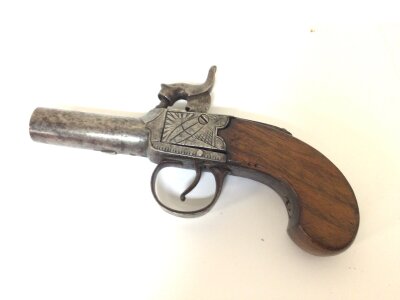 A 19th century Percussion pocket pistol slab sided with engraved steel action 15cm long.