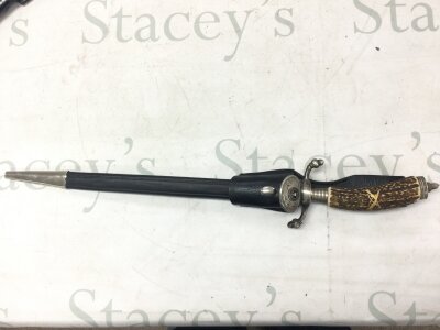 A WW2 German (Shutzen Vekband) dress dagger with leather frog, engraved blade by Alcoso Solingen (condition uncleaned near mint)