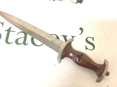A German Third Reich SA dagger with makers stamp and date of 1938 missing handle insets and scabbard