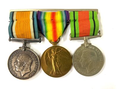 A mounted WW2 pair plus Defense medal, awarded to PTE G.G BISSETT A.S.C