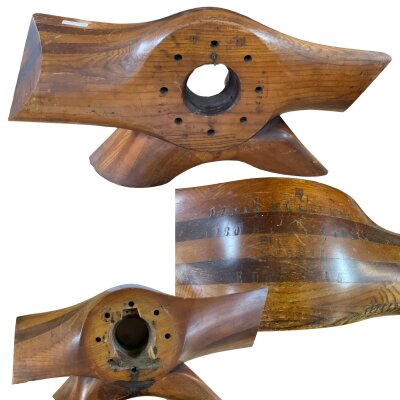 A WW1 era German propeller centre section, various impressed markings, with attached mount for use as a pocket watch stand.