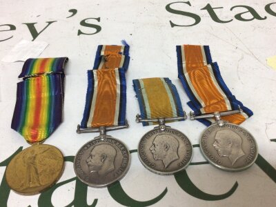 Four I world war medals awarded to 67241 T SJt G R Bond 22-London R (2) also one medal awarded to L-7642 Pte A E Curtis R W Kent and one other medal with a worn edge 102141 GNR E F J CHETT (?) RA. (4)