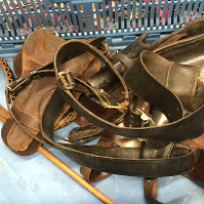 Leather pistol and knife holsters.