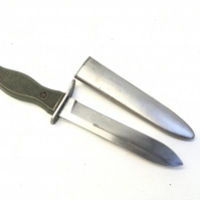 A Military fighting knife with a green grip stamped BW blade HSK 70. With steel scabbed.