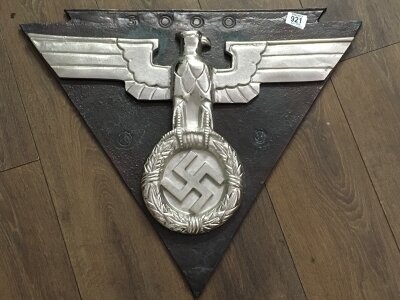 A Reproduction German Eagle plaque.  67cm wide 55cm tall.