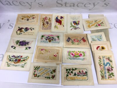 A collection of WW1 silk postcards.