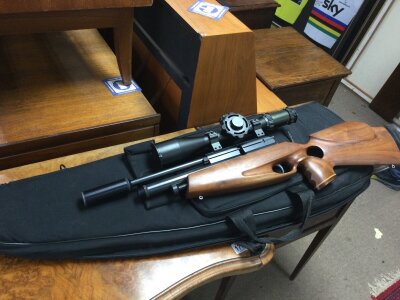 A BSA ultra PCP air rifle, with attached MTC Viper 4 2 16x50 scope.  22 cal. With case