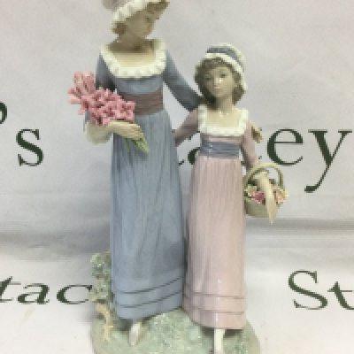 A Lladro figural group of flower girls, approx height 33cm. Shipping category D.