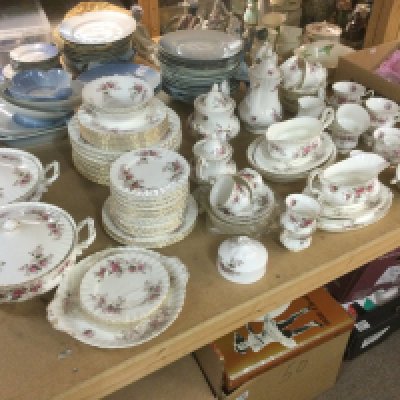 A Royal Albert tea and dinner service in Lavender Rose pattern. Shipping category D.