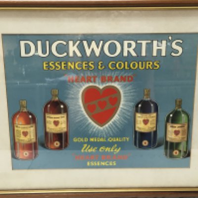 A framed advertisement for Ducksworth esscences and colours . Frame dimensions 54x44cm. This lot cannot be posted
