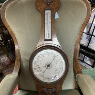 A 1930s Oak Aneroid barometer. 75cm.- NO RESERVE