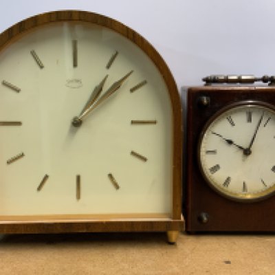 A vintage 1970s smiths mantle clock together with a small Victorian Officers clock.