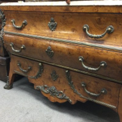 A Louis XV style bombe commode with brass applied mounts the Marble top above three drawers .50 cm x 125 cm height 90 cm .