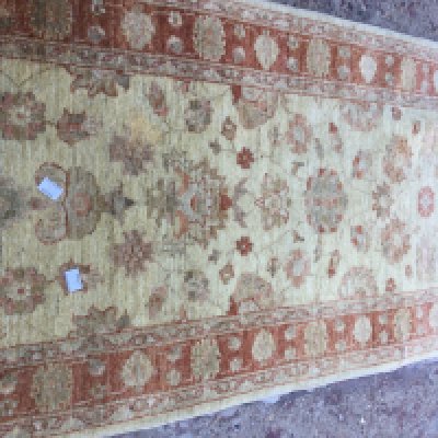 A Afghan floral ivory ground runner 280 cm x90 cm