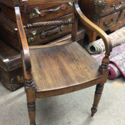 A 19th century Elm and Beechwood Vernacular open arm chair most likely East Anglia. With rope back and curved seat.