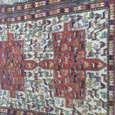 A Soumak rug the central field with Animal design and repeat pattern boarder . 140 x 116 cm .