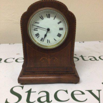 An Edwardian inlaid Mahogany mantel clock with a white enamel dial height 22cm