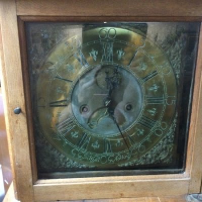 An oak eight day long cased clock. Shipping category D.