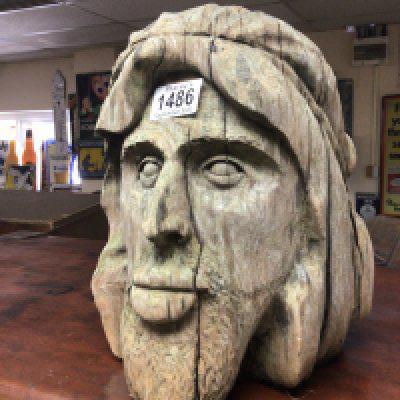 A carved wood sculpture the head of Christ. Height 26cm