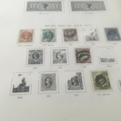 Four albums containing GB stamps together with three stock books.