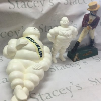 Three vintage advertising figures including Johnnie Walker (39cm tall) and Michelin Men (31cm & 47cm tall) both made in France, one with a mount.