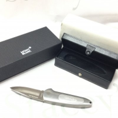 A boxed Mont Blonc stainless steel pocket knife with forever one super yacht engraving. This lot cannot be posted