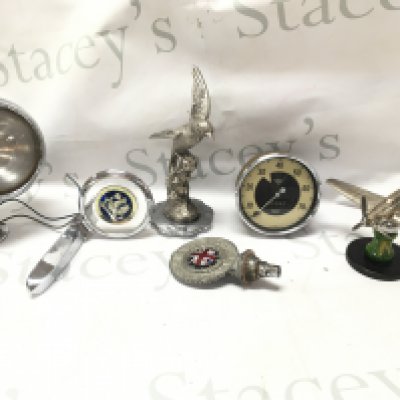 Vintage motoring items including a silver tone swallow mascot figurine , vintage chrome spotlight, Royal Automobile badge, Smiths speedometer, Hurricane aircraft mascot. This lot cannot be posted