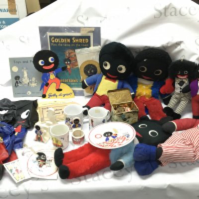 A collection of vintage golly items including soft toys, Robertsons mugs, plate, sailing club egg cup , inflatable blow up figures, shop window adverts and other advertising items. This lot cannot be posted